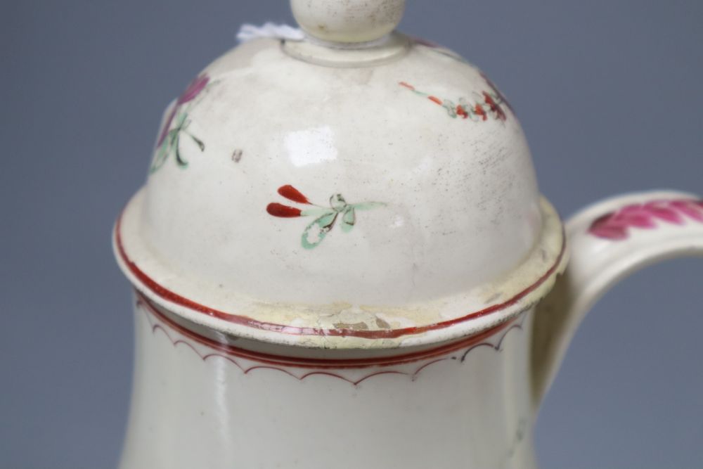 A late 18th century Leeds type creamware coffee pot and cover, an enamelled teapot and cover and a pearlware harvest jug, tallest 28c